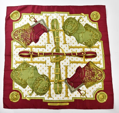 Lot 818 - HERMÈS; a 100% silk Selles a Housse scarf...