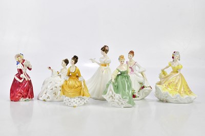 Lot 2697 - ROYAL DOULTON; a collection of seven figures...