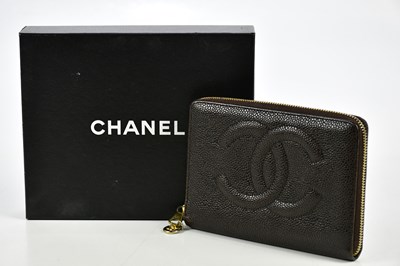 Lot 811 - CHANEL; a vintage brown caviar leather purse...