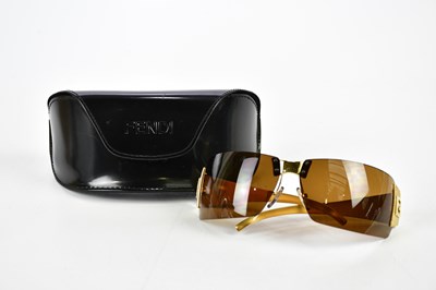Lot 851 - FENDI; a pair of brown tinted wraparound...