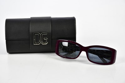 Lot 852 - DOLCE & GABANNA; a pair of unworn burgundy red...