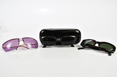 Lot 872 - GUCCI; a pair of small grey sunglasses with...
