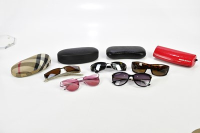 Lot 867 - CHANEL; an empty sunglasses case, an empty...