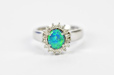 Lot 56 - A platinum enhanced black opal and diamond...