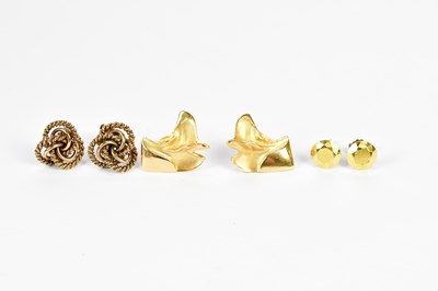 Lot 474 - A pair of 14ct yellow gold textured earrings,...