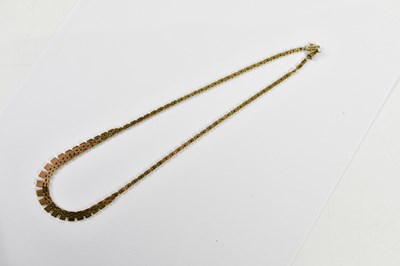 Lot 350 - A 9ct yellow gold 'organ pipe' necklace,...