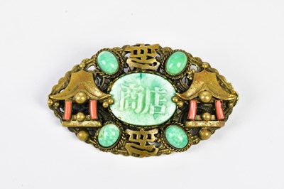 Lot 528 - A Chinese jade and coral set base metal brooch,...