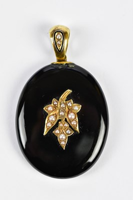 Lot 562 - A Victorian black onyx and seed pearl...