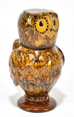 Lot 838 - A contemporary slipware owl jug and cover by...