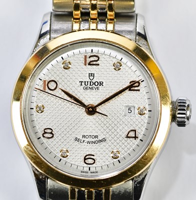 Lot 585 - TUDOR; a lady's as new steel and yellow metal...