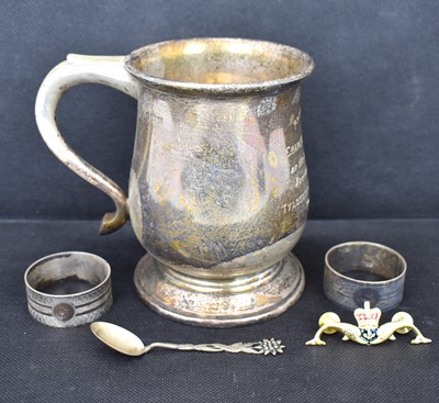 Lot 568 - A hallmarked silver mug inscribed 'Presented...