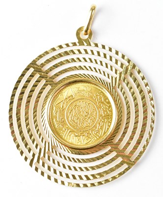 Lot 766 - A Saudi Arabian guinea in an 18ct yellow gold...