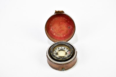 Lot 1359 - An early 20th century leather cased compass,...