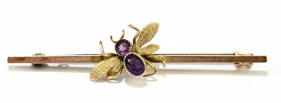 Lot 1455 - A 9ct yellow gold insect set bar brooch,...