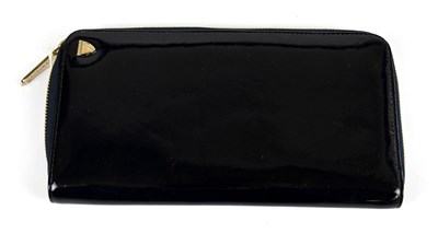 Lot 808 - ASPINAL OF LONDON; a navy blue patent leather...