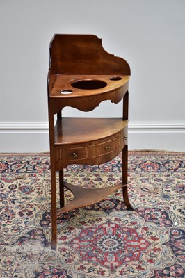 Lot 1085 - A 19th century mahogany corner washstand,...