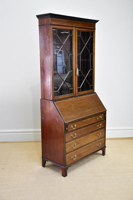 Lot 1035 - An Edwardian inlaid and crossbanded mahogany...