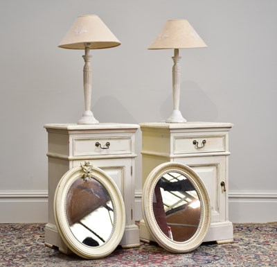 Lot 1112 - Two modern white painted bedside cabinets with...