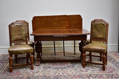 Lot 1001 - A good 1920s oak dining suite, comprising draw-...