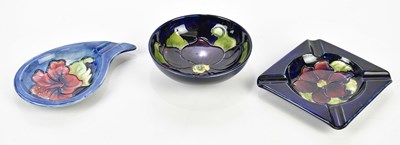 Lot 2662 - MOORCROFT; a footed bowl in the 'Clematis'...