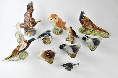 Lot 2699 - BESWICK; a collection of ten birds, including...
