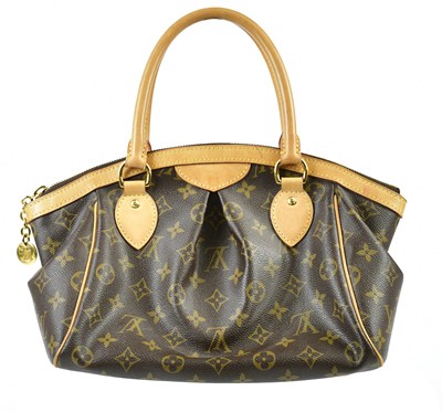 Lot 711 - LOUIS VUITTON; a Monogram coated canvas Tivoli...