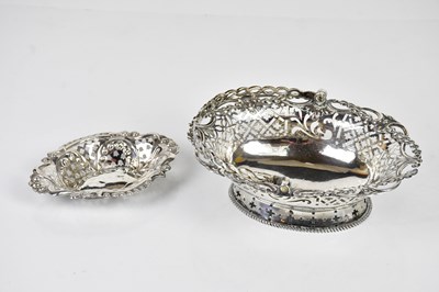 Lot 2458 - A George III hallmarked silver swing handled...