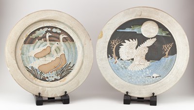 Lot 664 - WENDY NOLAN; two stoneware chargers decorated...