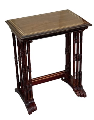 Lot 23 - A nest of three mahogany and brass inlaid...