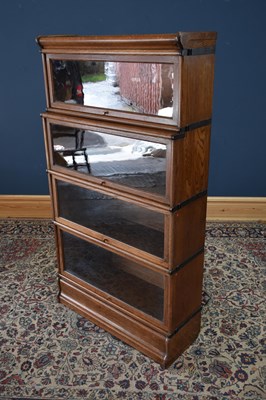 Lot 1008 - GLOBE WERNICKE CO LTD; an oak four tier...