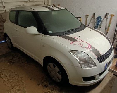 Lot 1241 - A SUZUKI Swift petrol three door hatchback,...