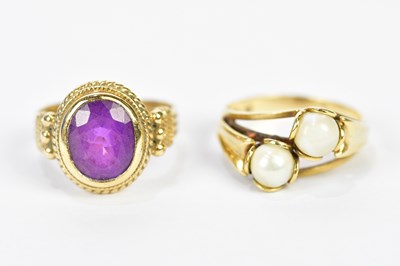 Lot 241 - A 9ct yellow gold amethyst set dress ring,...
