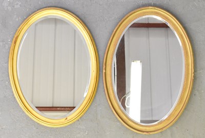 Lot 78 - A modern gilt framed oval wall miror, height...