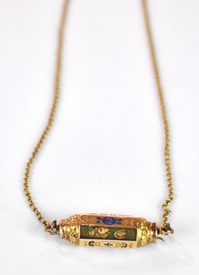 Lot 1259 - A Victorian yellow metal long chain set with...