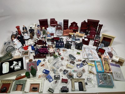 Lot 420 - A large collection of contemporary doll's...