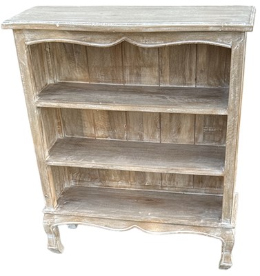 Lot 93 - A modern limed oak bookcase with two fixed...