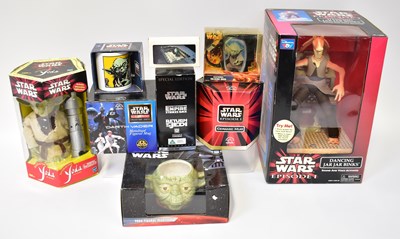 Lot 553 - STAR WARS; a collection of toys and other...