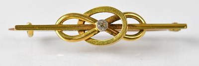 Lot 754 - A 15ct gold bar brooch with knot detail and...