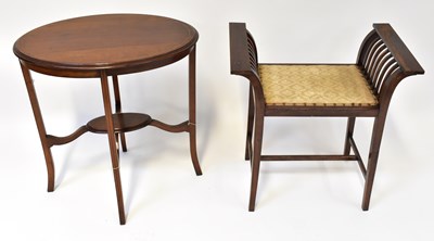 Lot 24 - An Edwardian mahogany inlaid oval occasional...