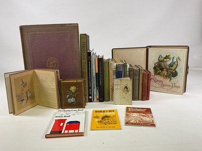 Lot 1396 - A collection of books together with two empty...