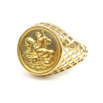 Lot 726 - A 9ct gold signet ring with central coin-style...