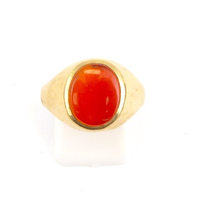 Lot 724 - A 9ct gold signet ring with bezel set...
