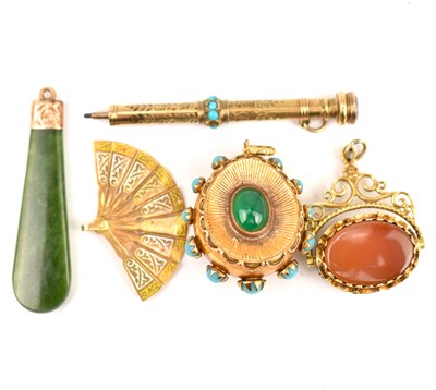 Lot 821 - A green drop jade pendant with yellow top,...