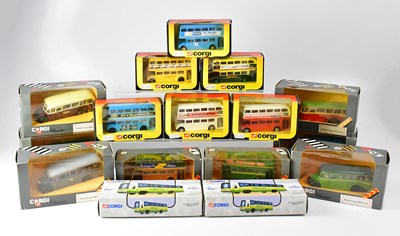 Lot 821 - CORGI; twenty-six diecast model buses and...