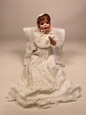 Lot 341 - HEUBACH KOPPELSDORF; a bent limbed baby doll,...