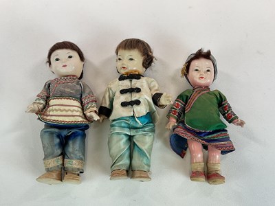 Lot 348 - Three vintage Oriental composition dolls in...