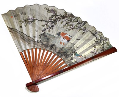 Lot 554 - A large Japanese bamboo fan, hand painted with...