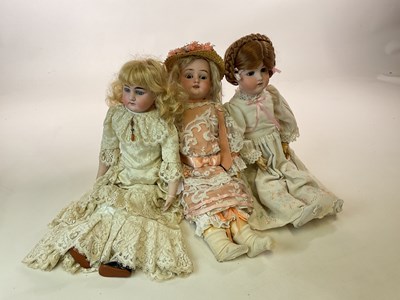 Lot 356 - Three bisque headed dolls comprising AM 3700...