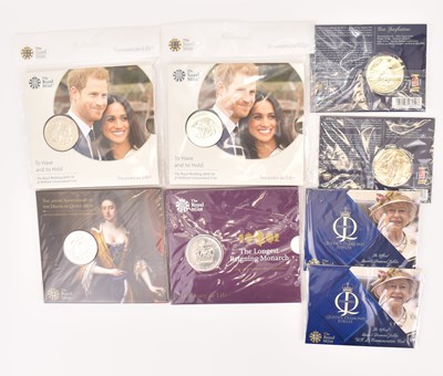 Lot 633 - THE ROYAL MINT; eight UK £5 brilliant...