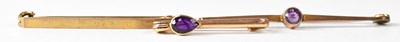 Lot 755 - A 15ct yellow gold bar brooch set with a...
